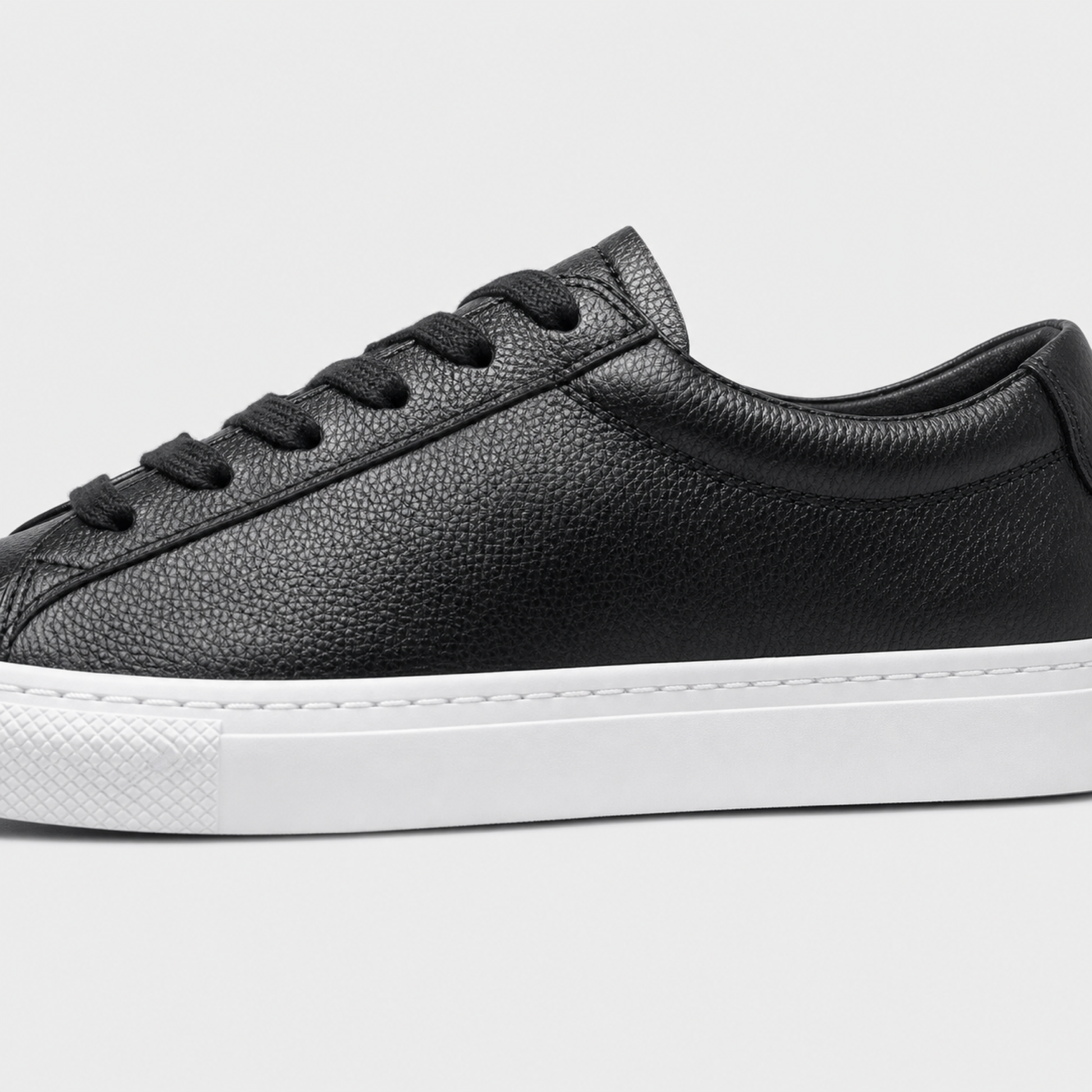 Black / White Sole classic leather low-top sneaker leather and construction detail