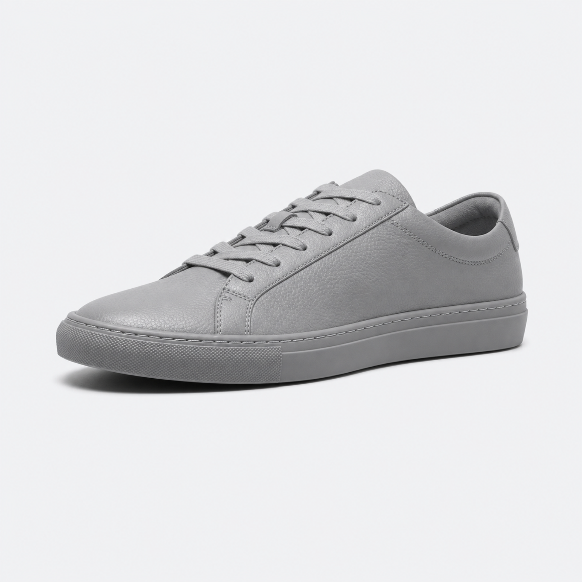 Grey classic leather low-top sneaker three-quarter view