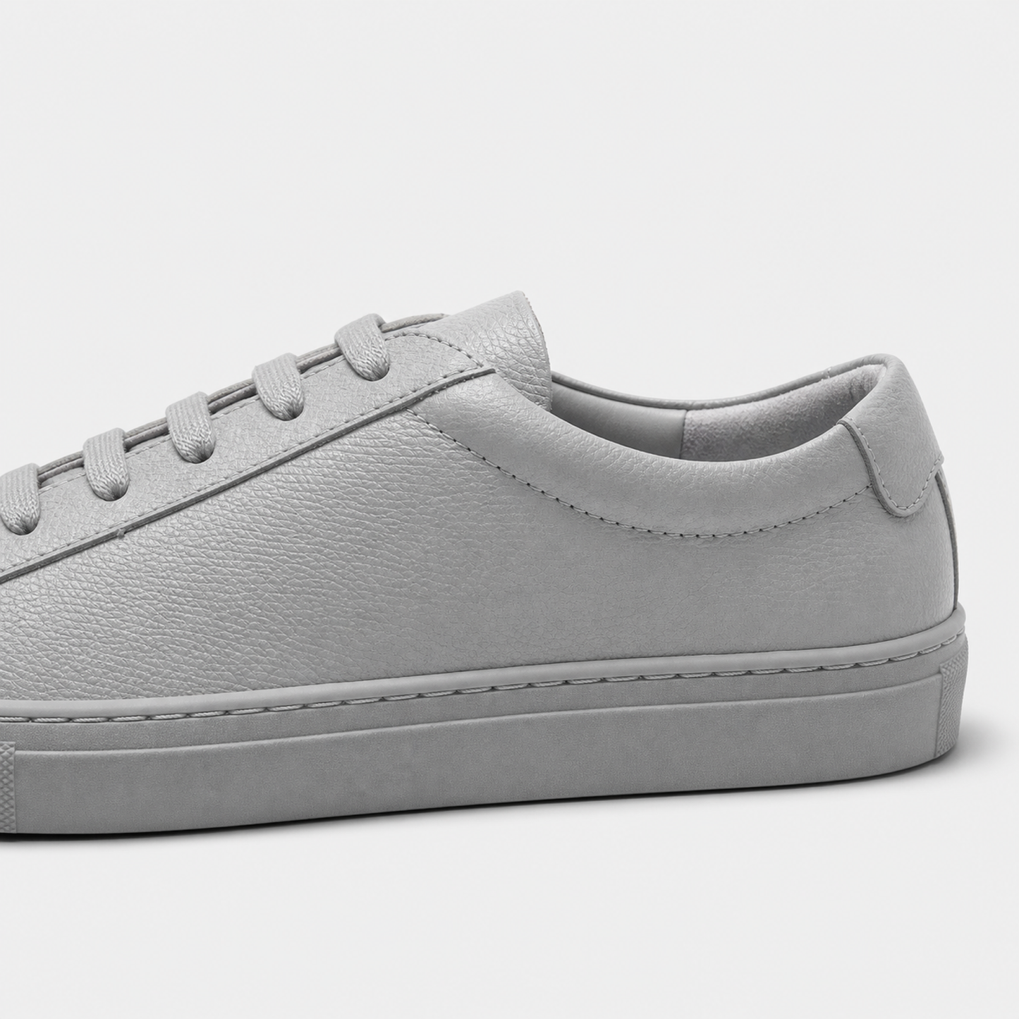 Grey classic leather low-top sneaker leather and construction detail