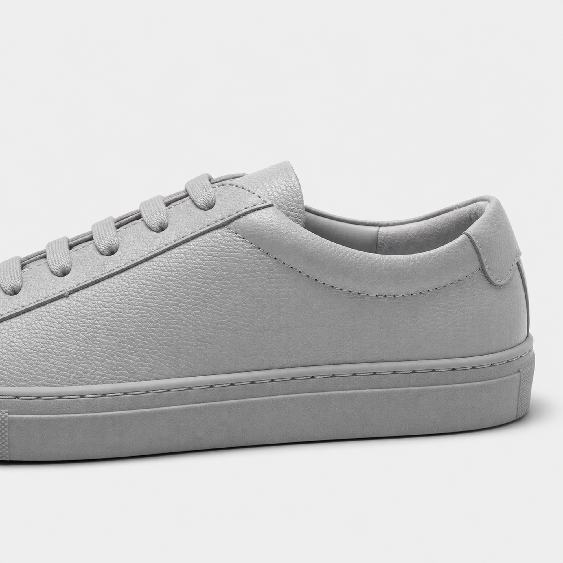 Grey classic leather low-top sneaker leather and construction detail