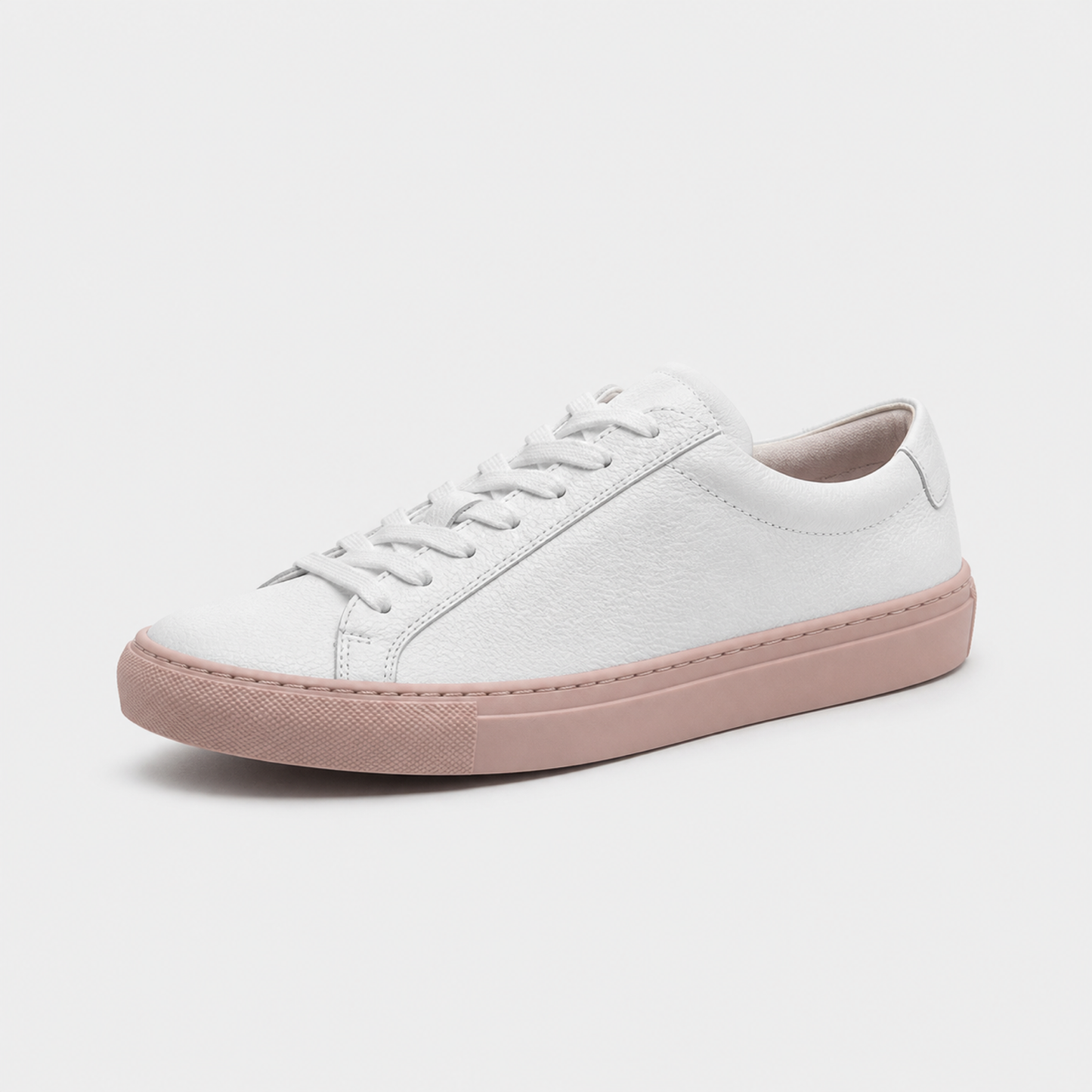 White / Blush Sole classic leather low-top sneaker three-quarter view