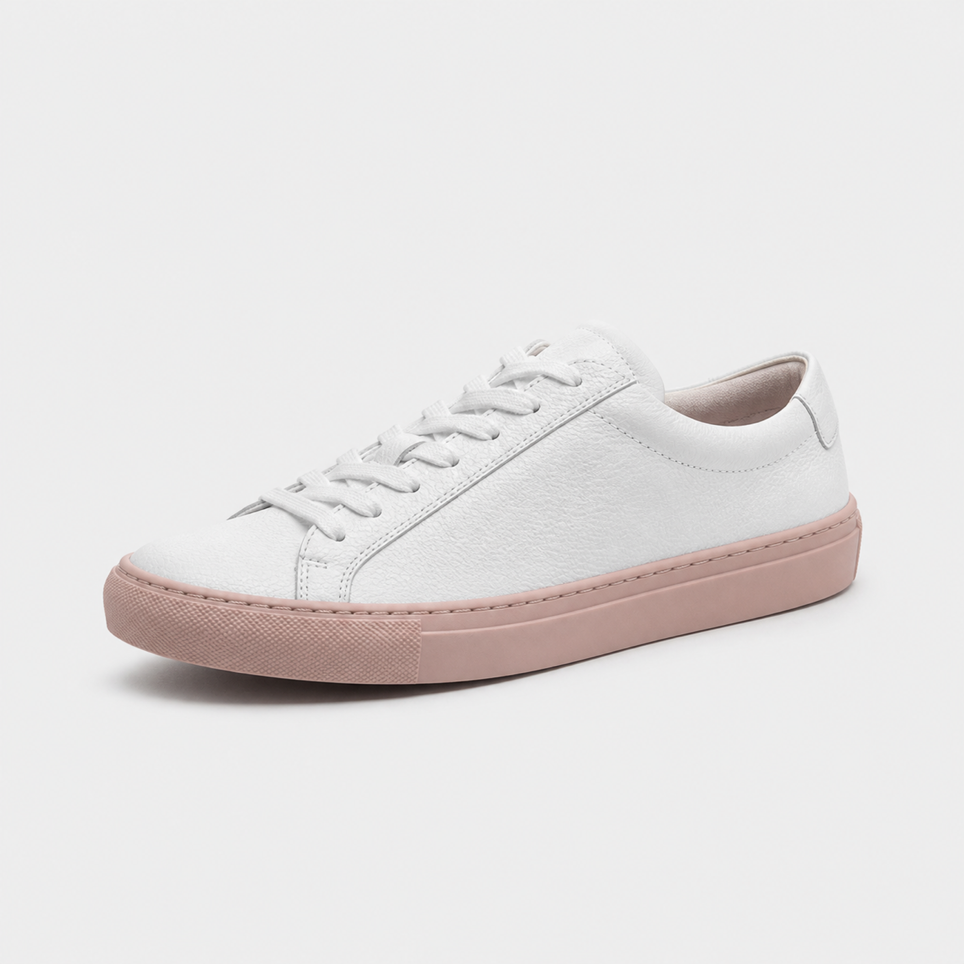 White / Blush Sole classic leather low-top sneaker three-quarter view