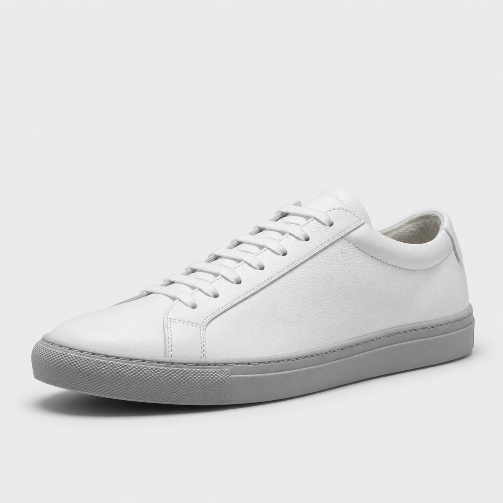 White / Grey Sole classic leather low-top sneaker three-quarter view