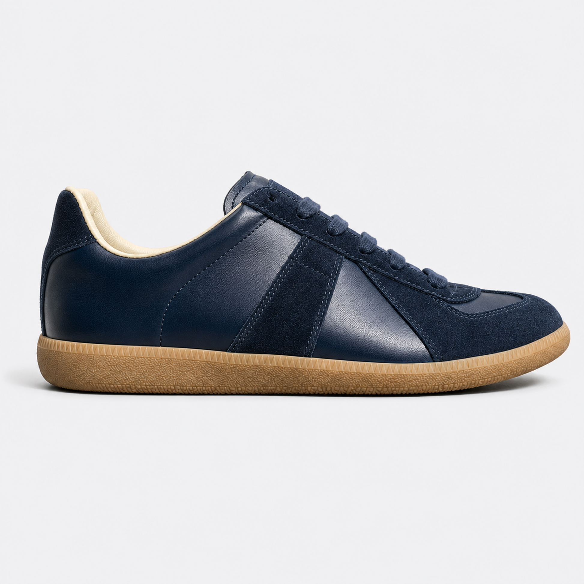 Dark Blue Gum GAT leather and suede low-top trainer side view